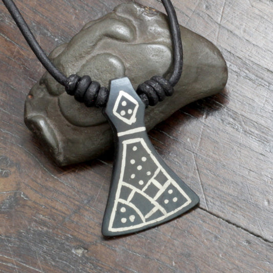 Hand forged Viking axe pendant inspired after the historical Mammen axe, decorated with silver inlay using the same technique