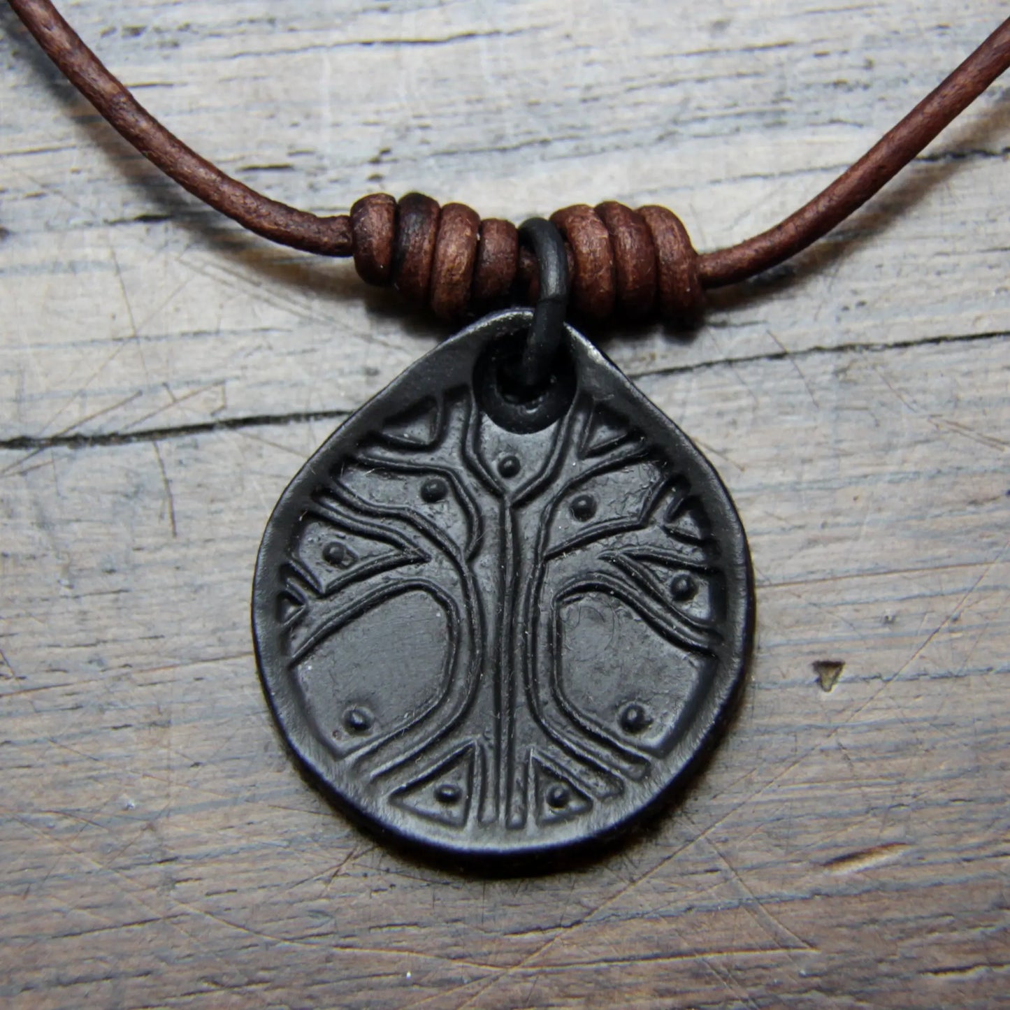 Norse Viking Yggdrasil Tree Iron Coin Pendant on a leather necklace Taitaya Forge