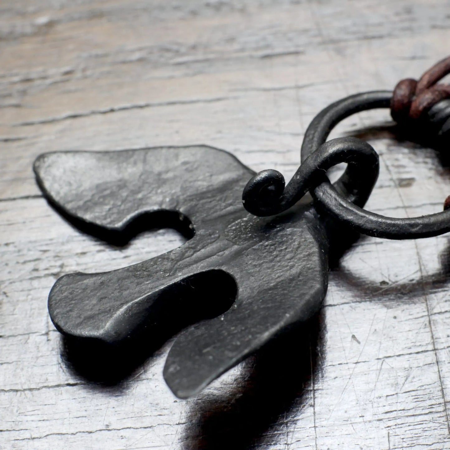 Custom Silver Inlaid Iron Raven Pendant