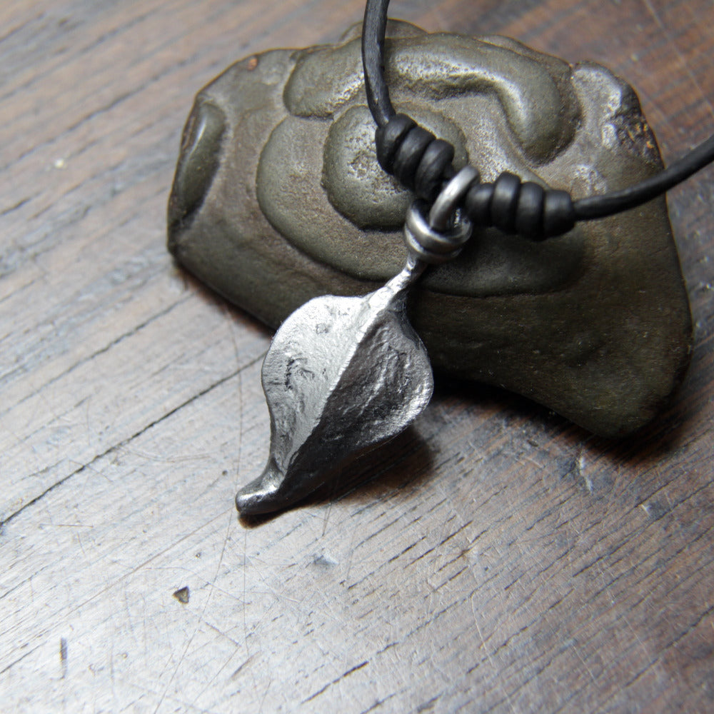 Small forged Iron Leaf Pendant with a silver colour finish by Taitaya Forge