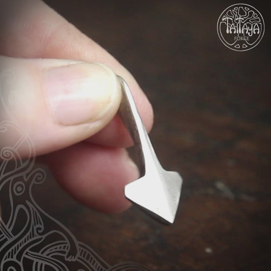 Video of the small hot forged silver minimalist Thors hammer  pendant, made and designed by Taitaya Forge.