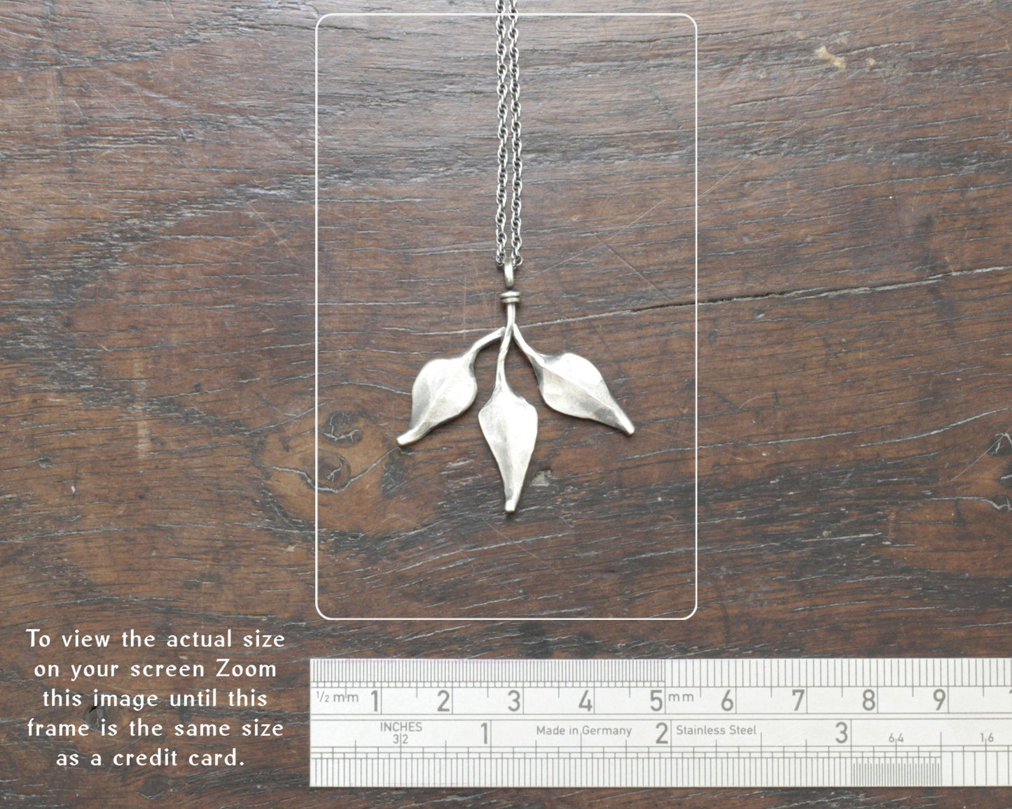 Triple leaf silver pendant. Unique hand forged solid silver necklace on a rope chain.