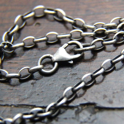 Add a silver chain to your pendant.