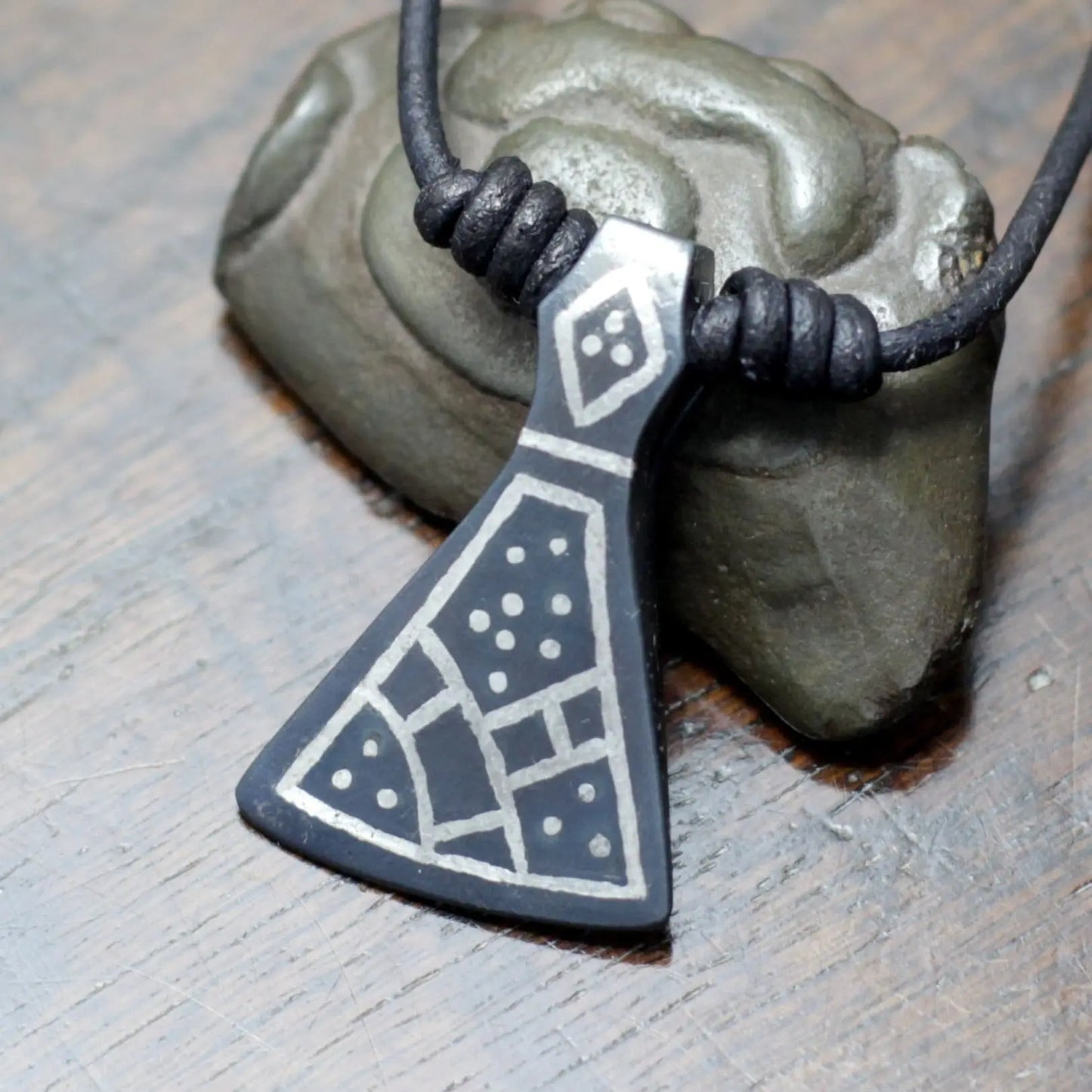 Hand forged Viking axe pendant inspired after the historical Mammen axe, decorated with silver inlay using the same technique