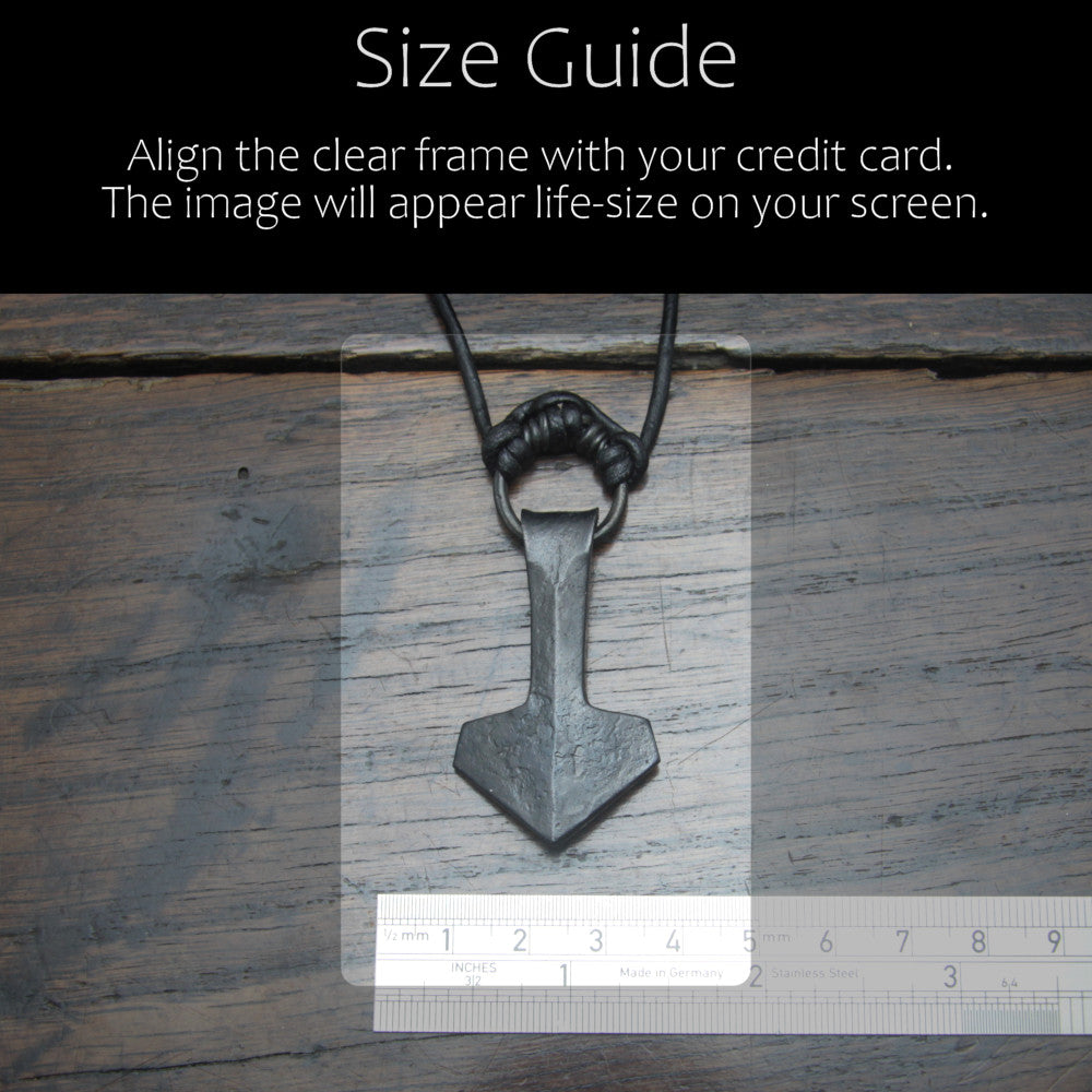 Hand forged large ridnged  iron Mjolnir Thor's hammer pendant made by taitaya forge, size guide in comparison with a credit card and ruler