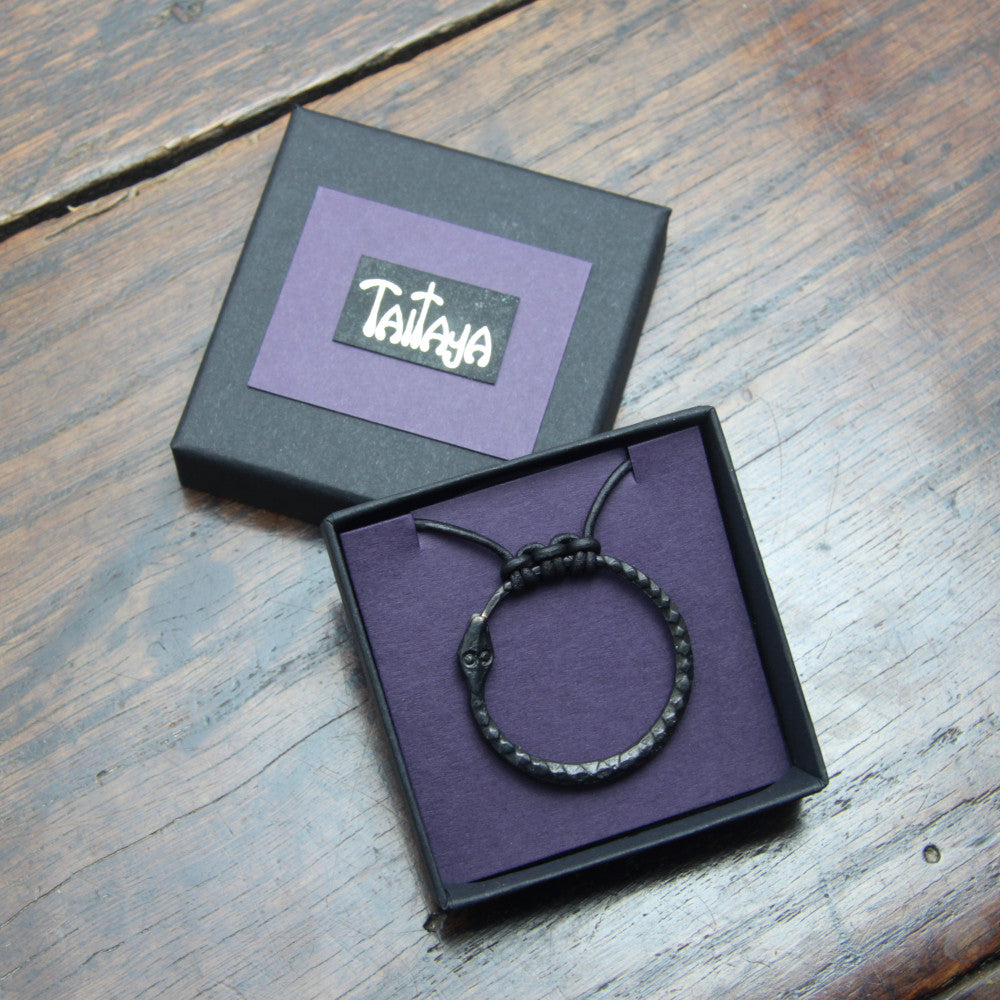 Ouroboros Snake Pendant, an infinity symbol hand forged out of pure iron