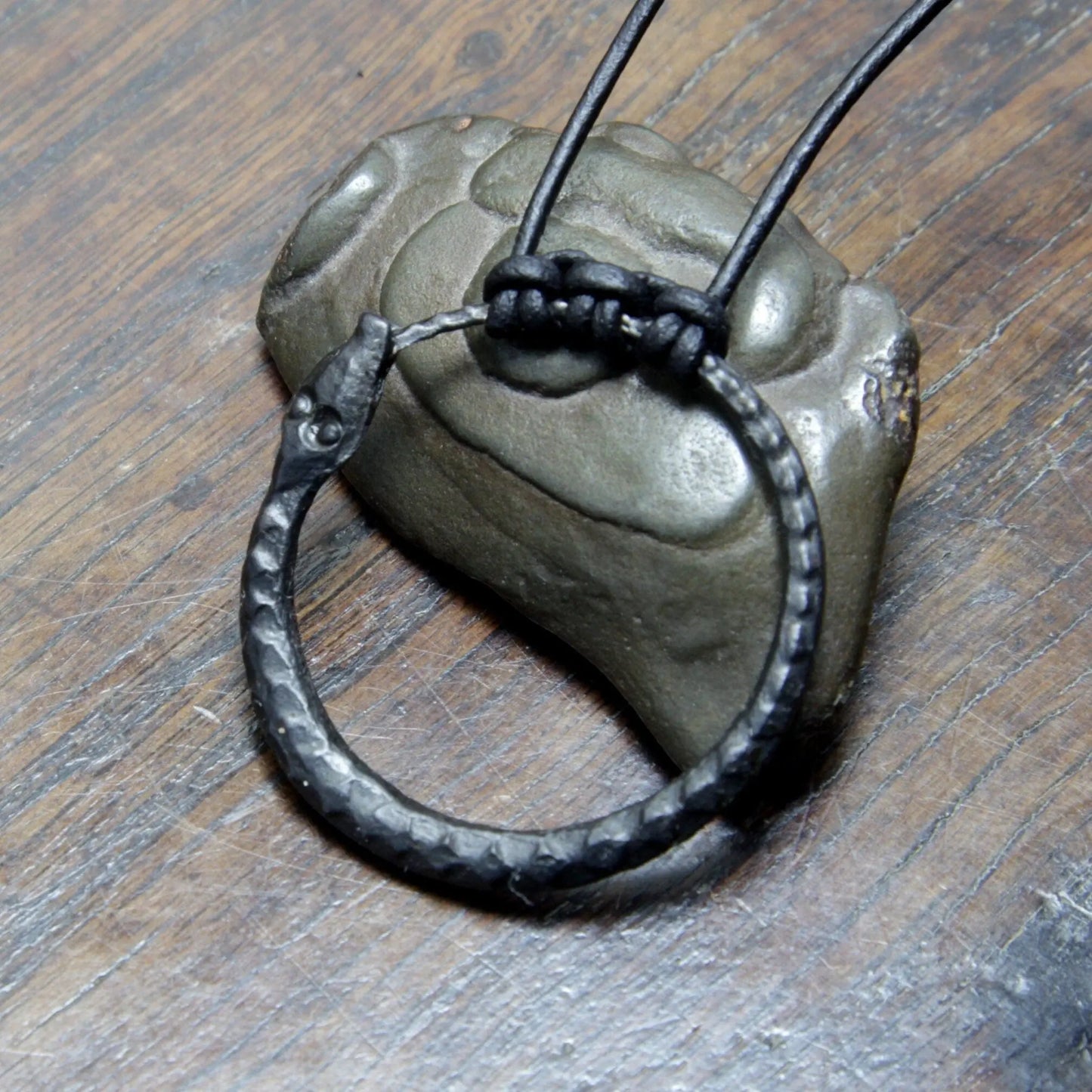 Ouroboros Snake Pendant, an infinity symbol hand forged out of pure iron