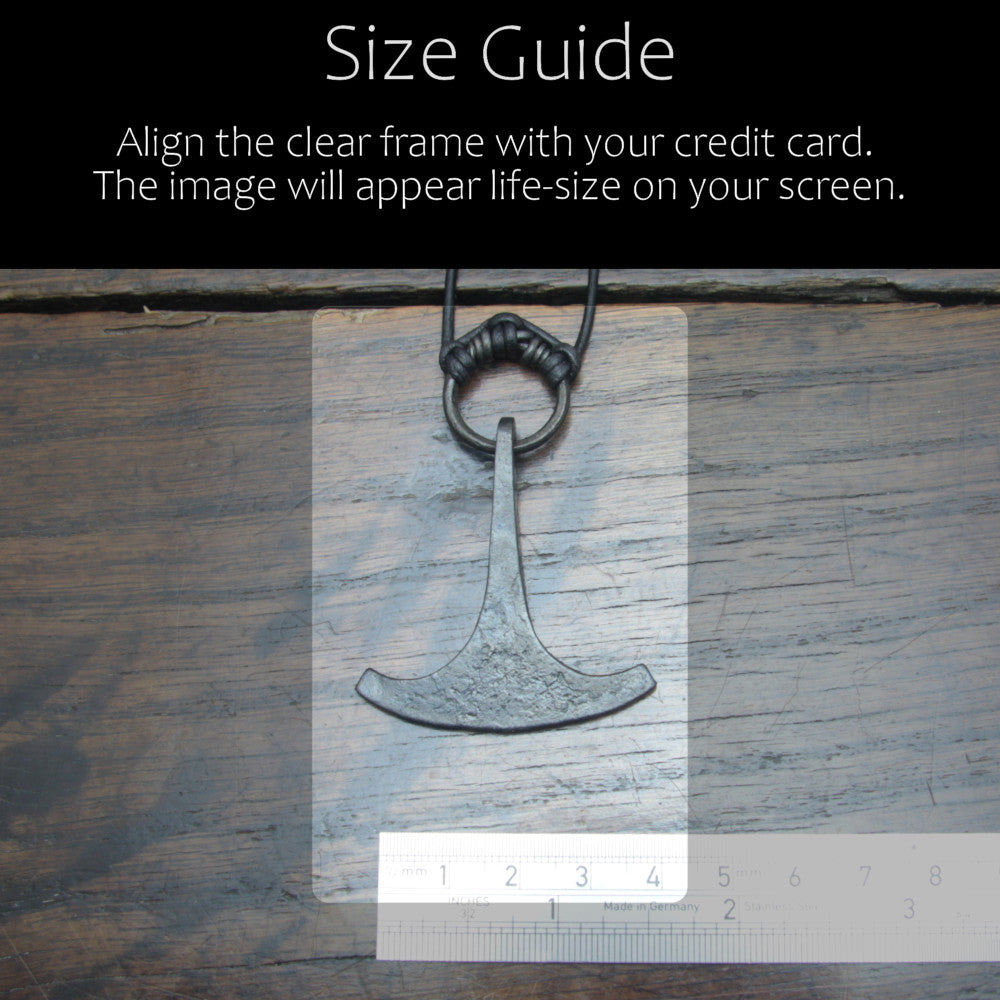 Handforged Finnish iron Ukonvasara pendant made by taitaya forge, size guid in comparison with a credit card and ruler