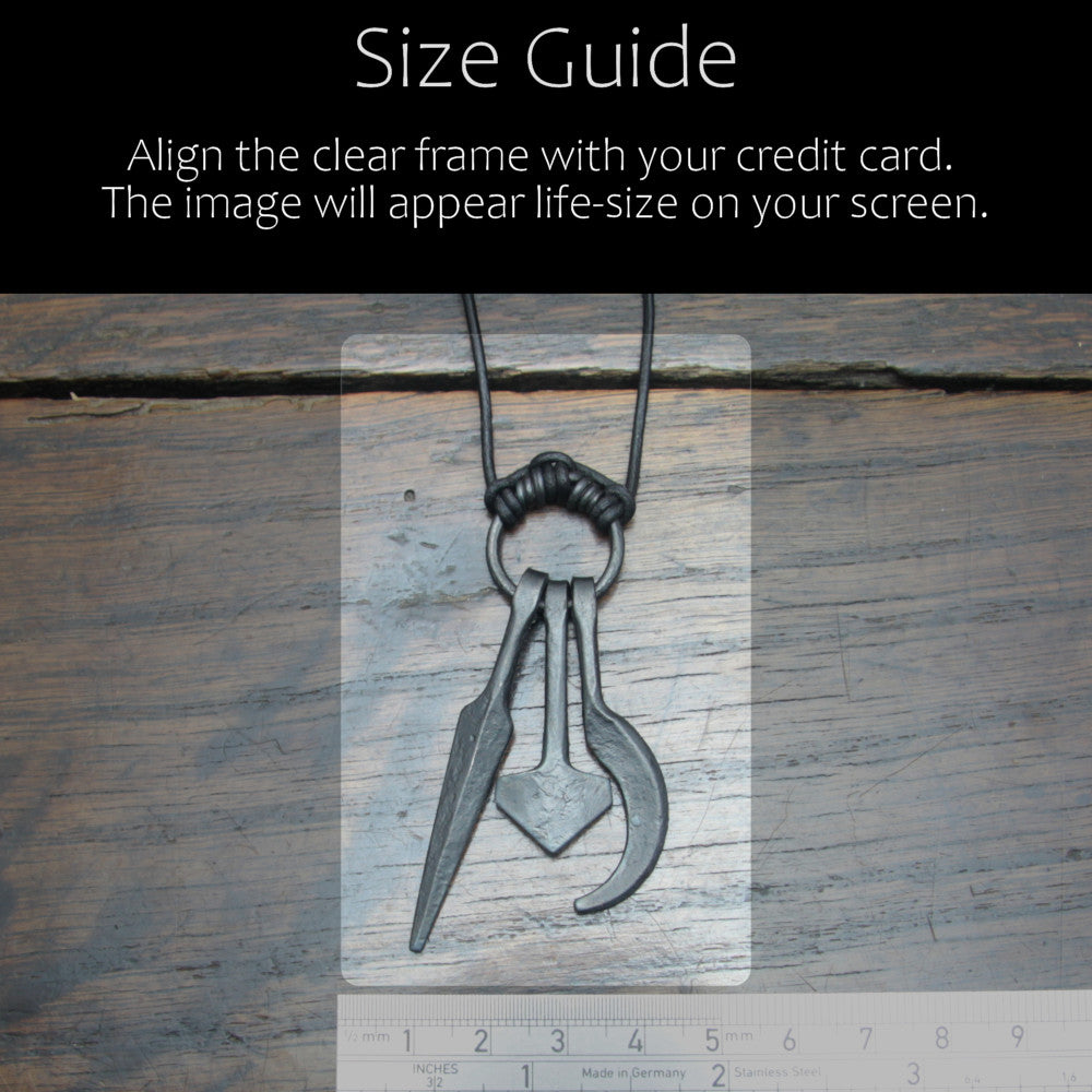 Uppsala Amulet ring pendant. Hand forged black iron necklace with a sickle, hammer and spear. Size guide in comparison to credit card or ruler