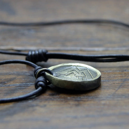 Valknut Hrungnir's Heart Iron Coin Necklace. Norse Viking style medallion pendant that can be personalised with silver inlay or an engraving