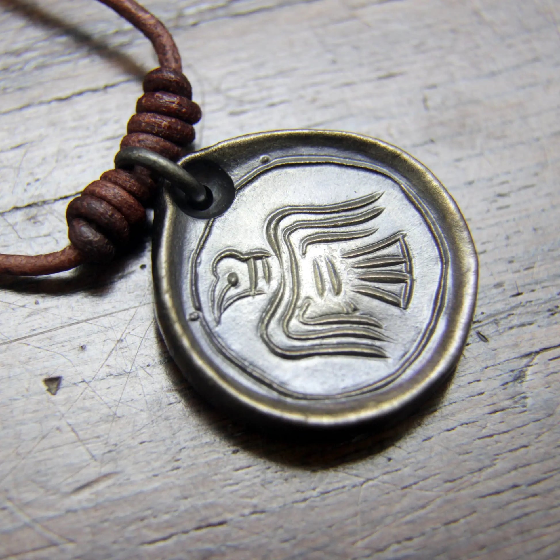 Viking Raven Iron Coin Necklace. Norse Raven medallion pendant that can be personalised with silver inlay or a personal engraving.