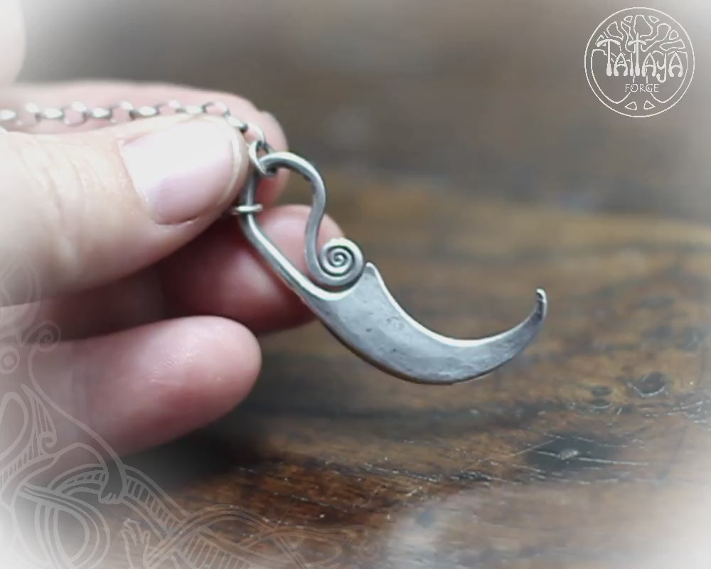 Forged silver sickle pendant by M.Barran, Taitaya Forge, UK